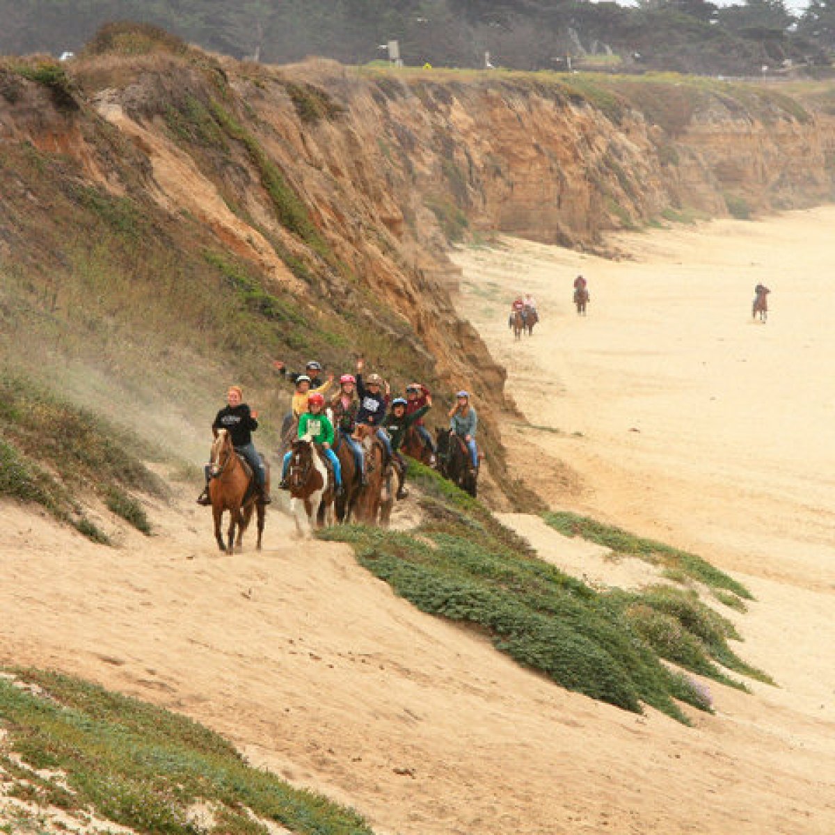 Group riding on the Half Moon Bay bluffs